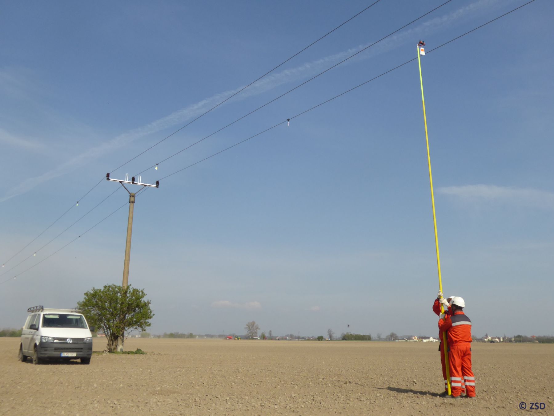 Installation of the flight diverters on the power lines